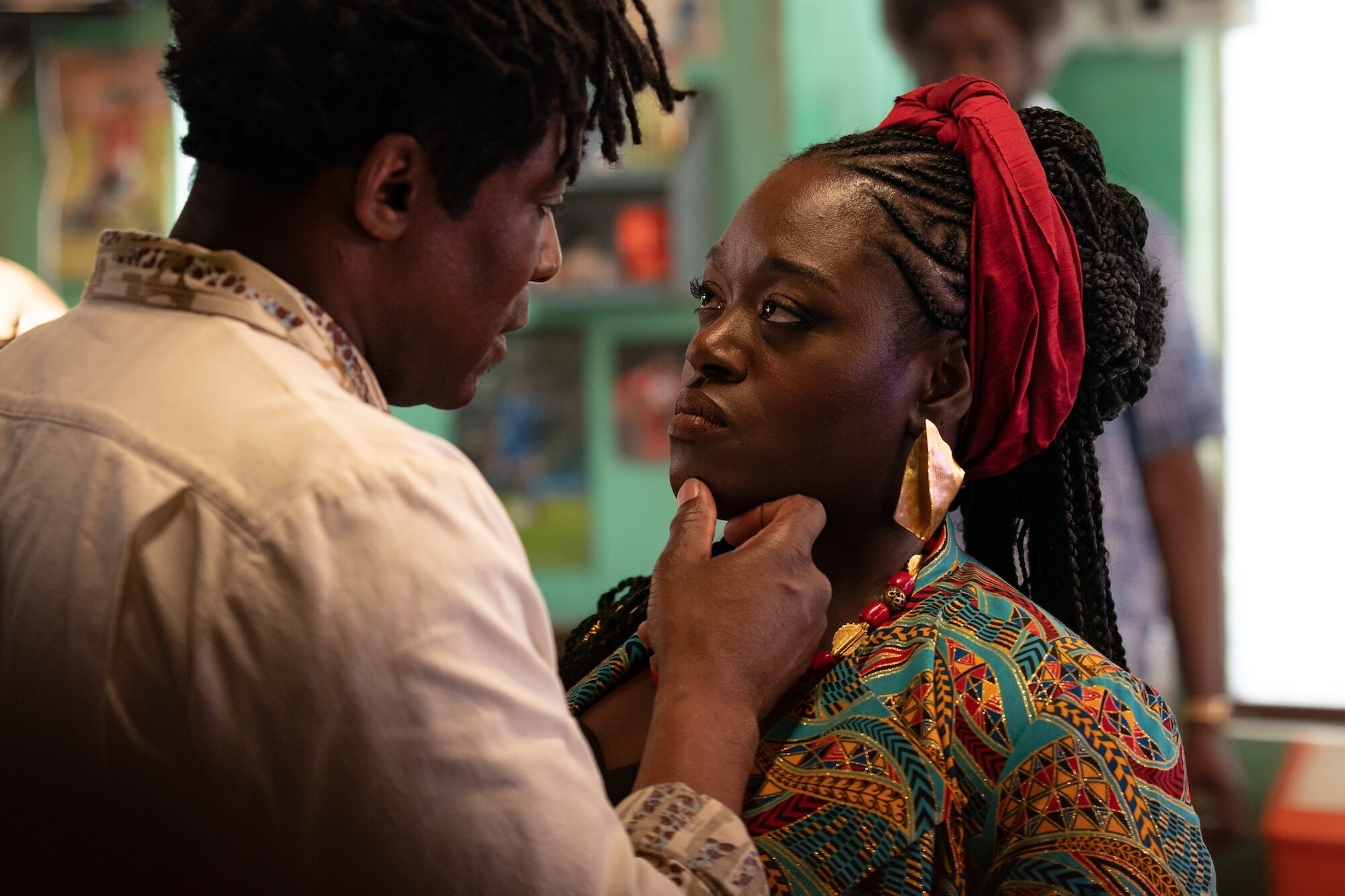The Barber (Ariyon Bakare) and Abena (Michelle Asante)